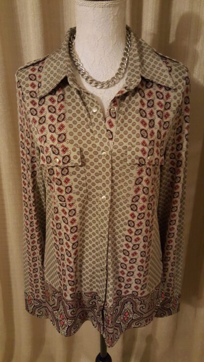 A brown and red patterned shirt is on display.
