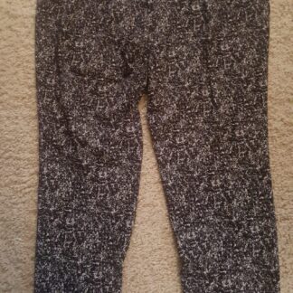 A pair of pants that are on the floor.