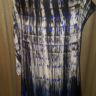 A dress that is hanging up in the room.