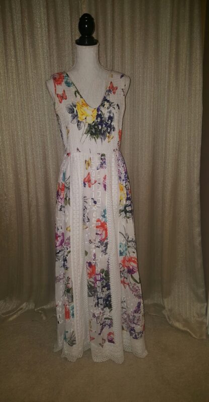A white dress with flowers on it