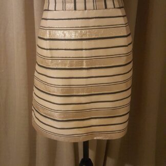 A striped skirt is shown on display.