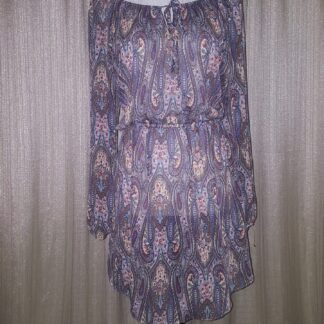A purple dress with paisley designs on it.