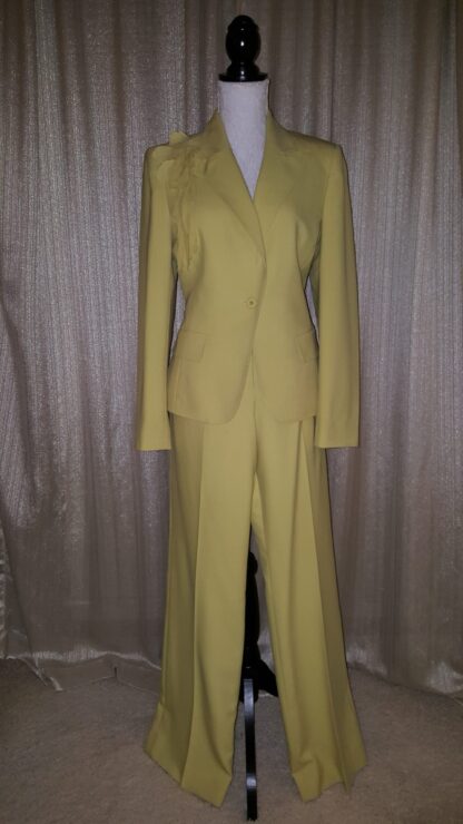 A yellow suit is shown on display.