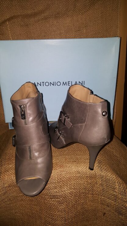 A pair of shoes that are on top of a box.