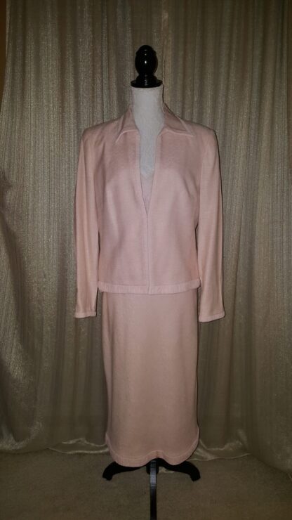 A pink suit is shown with a white shirt.