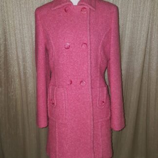 A pink coat is shown on display.