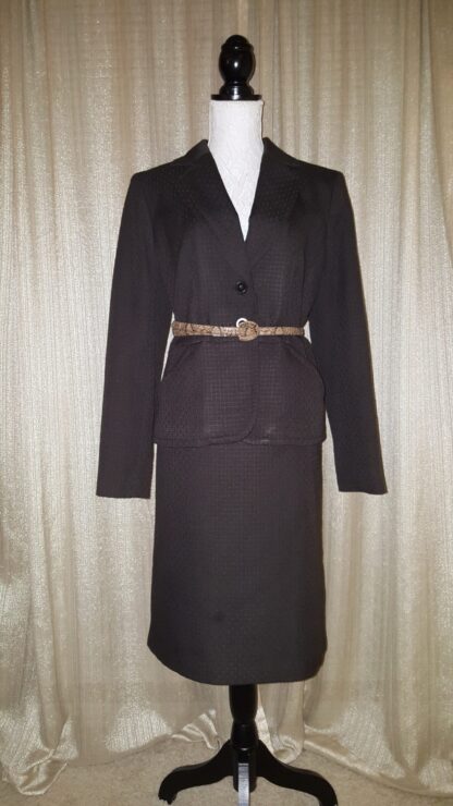A black suit with belt and jacket