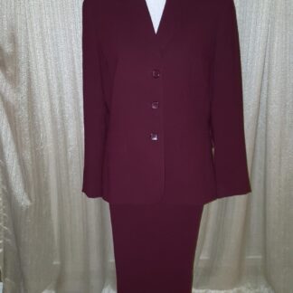 A suit that is red and has buttons on it.