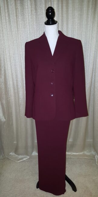 A suit that is red and has buttons on it.