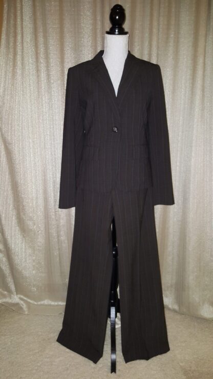 A suit that is black and has no buttons.