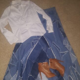 A pair of shoes and a shirt on the floor.
