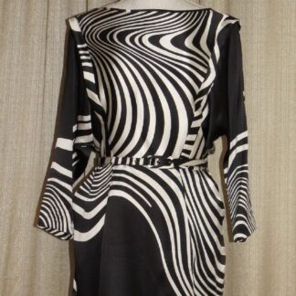 A black and white dress with long sleeves
