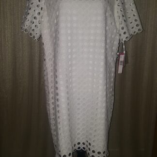 A white dress with a pattern on it