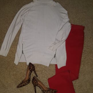 A white shirt and red pants with heels