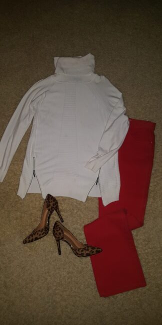 A white shirt and red pants with heels