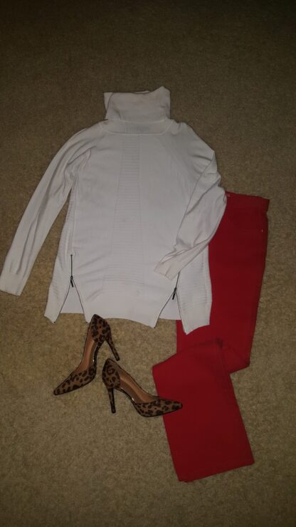 A white shirt and red pants with heels